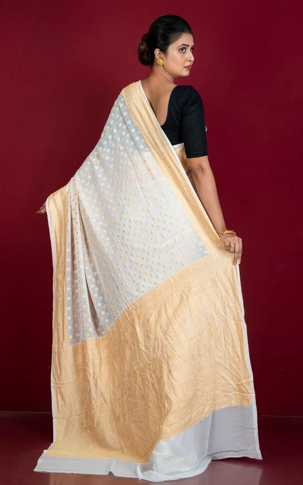Hand_Woven_Medium_Border_Khaddi_Georgette_Banarasi_Saree_In_Off_White_And_Matt_Gold