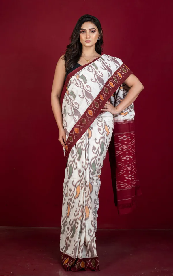 Soft_Mercerized_Cotton_Ikkat_Pochampally_Saree_In_Off_White_Maroon_Amber_Orange_And_Green