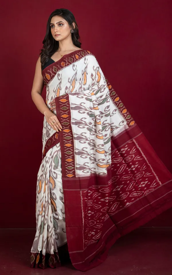 Soft_Mercerized_Cotton_Ikkat_Pochampally_Saree_In_Off_White_Maroon_Amber_Orange_And_Green