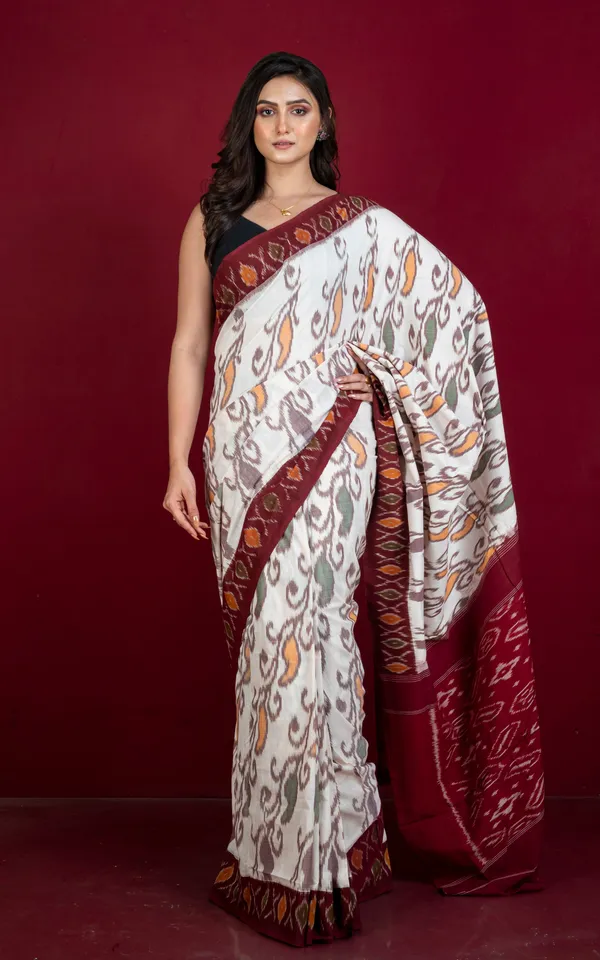 Soft_Mercerized_Cotton_Ikkat_Pochampally_Saree_In_Off_White_Maroon_Amber_Orange_And_Green