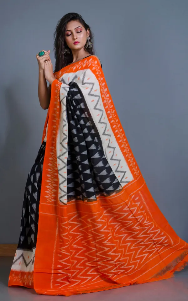 Soft_Mercerized_Cotton_Ikkat_Pochampally_Saree_In_Black_Off_White_Grey_And_Orange