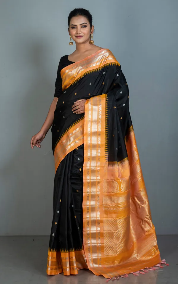 Hand_Woven_Exclusive_Kuttu_Gadwal_Silk_Saree_In_Black_Apricot_With_Silver_And_Golden_Zari_Work