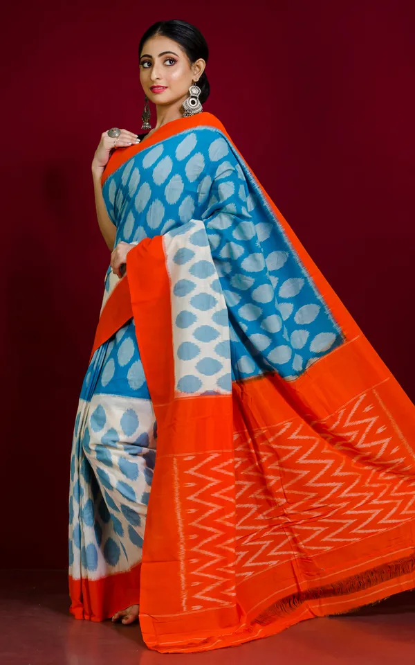 Soft_Mercerized_Cotton_Ikkat_Pochampally_Saree_In_Cyan_Off_White_And_Orange