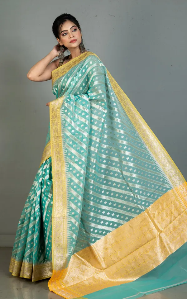 Designer_Kora_Organza_Silk_Banarasi_Saree_In_Medium_Turquoise_With_Pastel_Yellow_And_Silver_Aara_Zari_Nakshi_Work