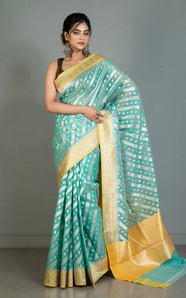 Designer_Kora_Organza_Silk_Banarasi_Saree_In_Medium_Turquoise_With_Pastel_Yellow_And_Silver_Aara_Zari_Nakshi_Work