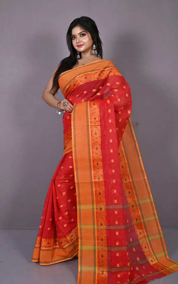 Matta_Border_With_Lotus_And_Paisley_Nakshi_Work_Bengal_Tangail_Hazar_Butti_Cotton_Saree_In_Red_Green_And_Orange