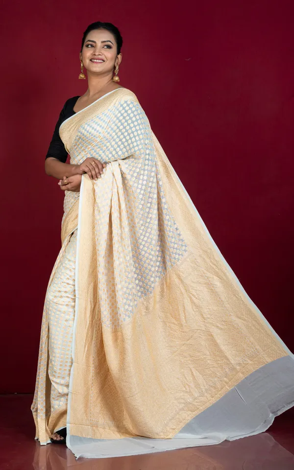 Hand_Woven_Medium_Border_Khaddi_Georgette_Banarasi_Saree_In_Titan_White_And_Cashmere_Gold