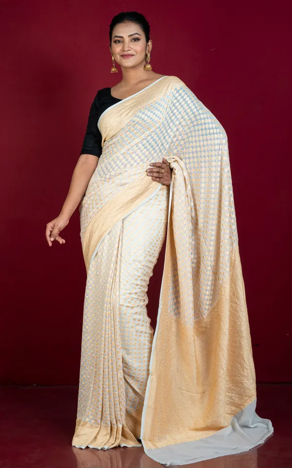 Hand_Woven_Medium_Border_Khaddi_Georgette_Banarasi_Saree_In_Titan_White_And_Cashmere_Gold