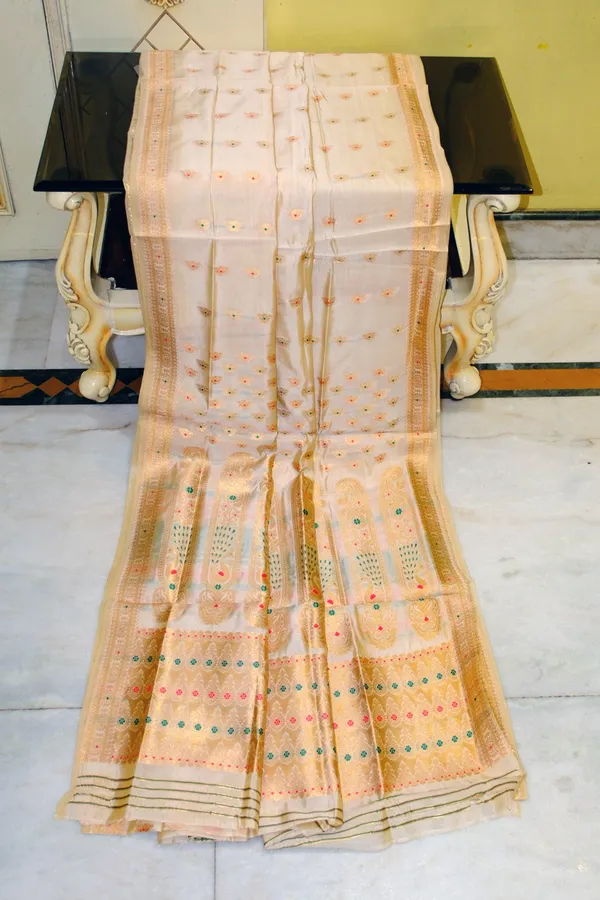 Traditional_Assam_Silk_Mekhla_Saree_In_Light_Beige_Dark_Green_Red_And_Pale_Golden