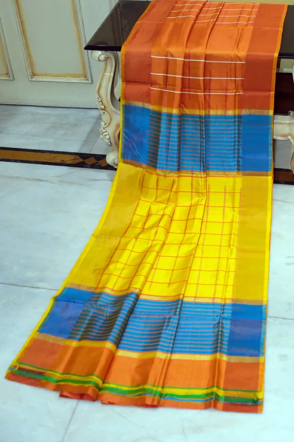 Hand_Woven_Bishnupuri_Checks_Katan_Silk_Saree_In_Burning_Orange_Nice_Blue_Bright_Yellow_And_Off_White