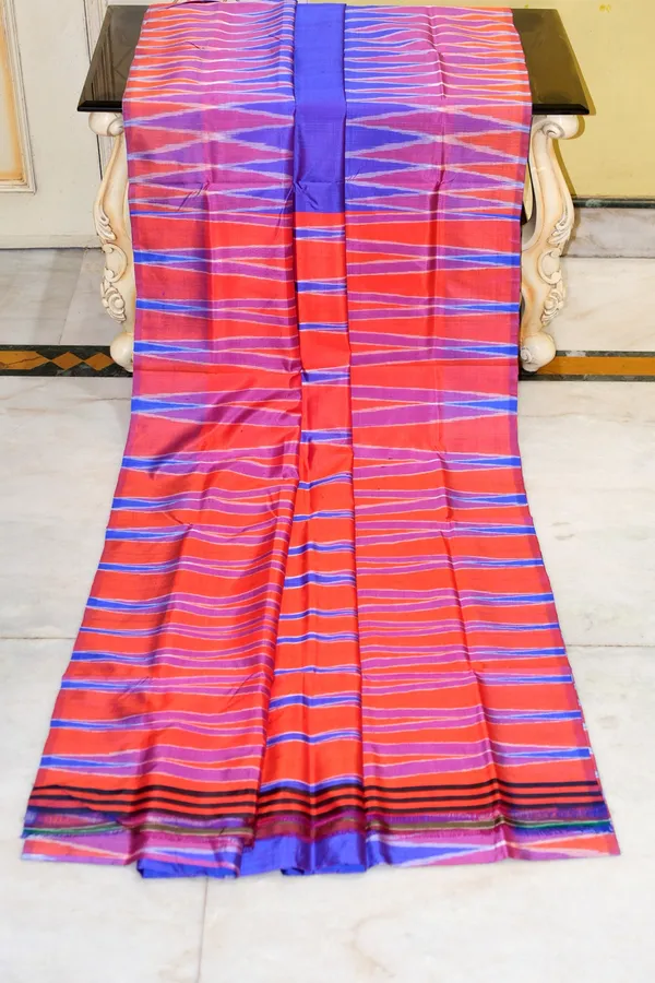 Bishnupuri_Double_Ikkat_Pure_Silk_Saree_In_Lotus_Blue_Bright_Orange_And_Off_White