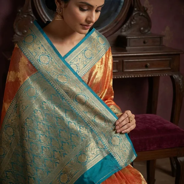 Tissue_Banarasi_Silk_Saree_In_Salmon_Orange_Teal_And_Matte_Gold
