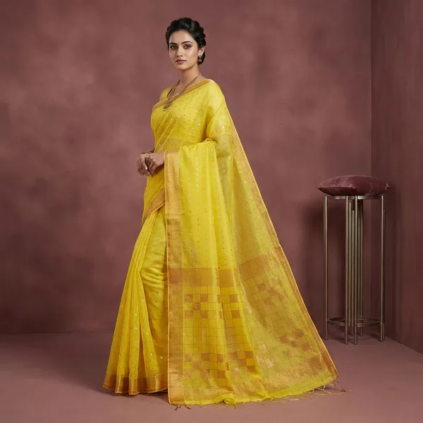 Designer_Sitara_Work_Skirt_Border_Muslin_Silk_Saree_In_Yellow_Silver_And_Copper
