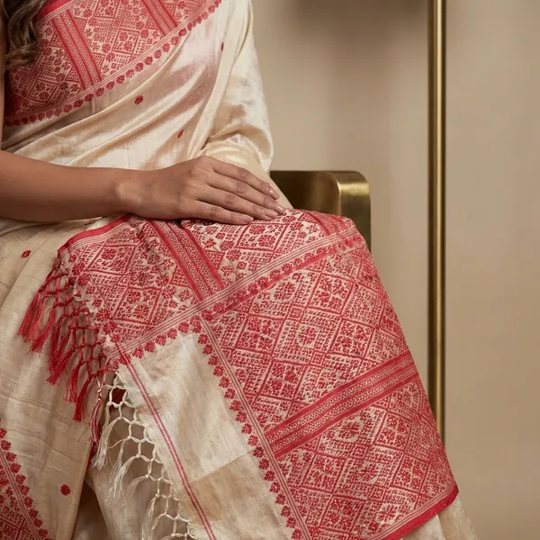 Premium_Quality_Assamese_Nakshi_Motif_Inspired_Hand_Woven_Work_On_Tussar_Silk_Saree_In_Parmesan_And_Red