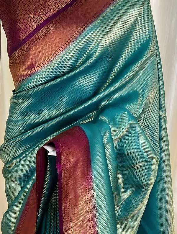 Blue_And_Maroon_Kanjivaram_Solid_Woven_Design_Saree_For_Women