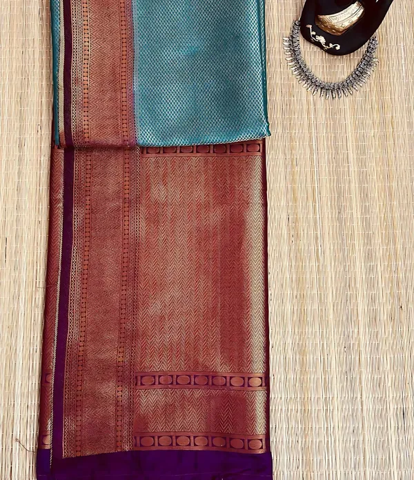 Blue_And_Maroon_Kanjivaram_Solid_Woven_Design_Saree_For_Women