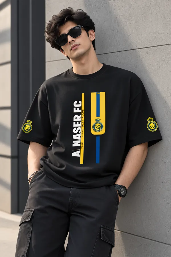 Giffy_Life_Men's_Black_Oversized_Graphic_T-Shirt_-_Drop_Shoulder_Cotton_Al_Nassr_FC_Yellow_Crest_Stripe_Football_Bloke-Core_Streetwear_Tee