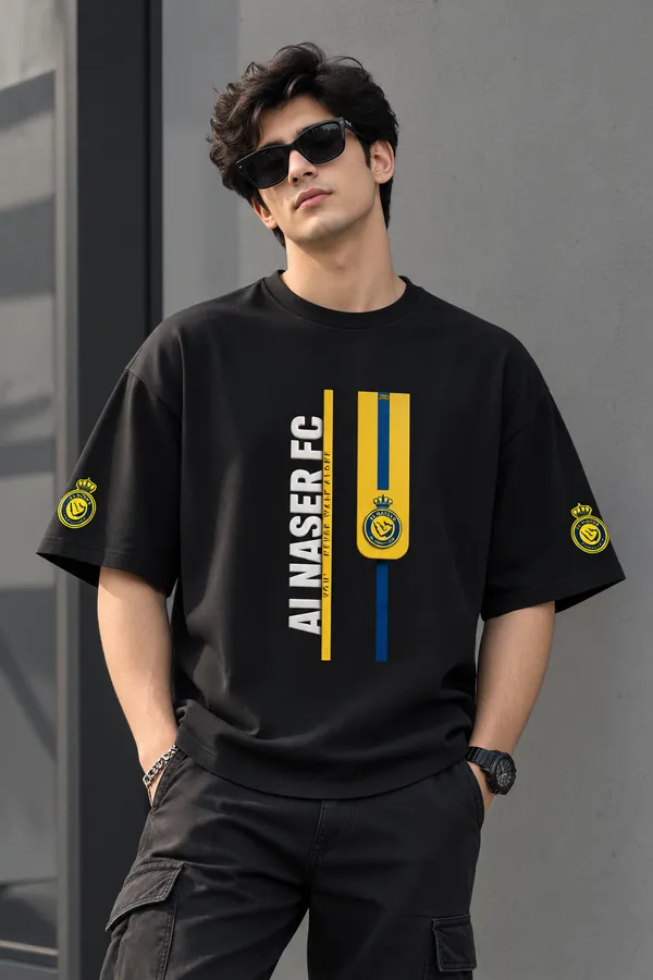 Giffy_Life_Men's_Black_Oversized_Graphic_T-Shirt_-_Drop_Shoulder_Cotton_Al_Nassr_FC_Yellow_Crest_Stripe_Football_Bloke-Core_Streetwear_Tee