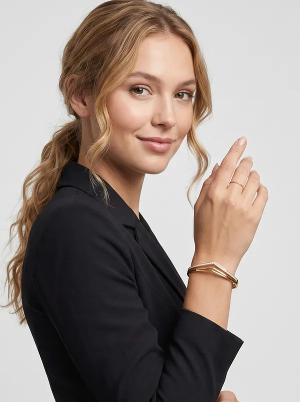 Modern_Geometric_Gold_Chevron_Bangle_–_Layered_Crystal_Statement_Bracelet