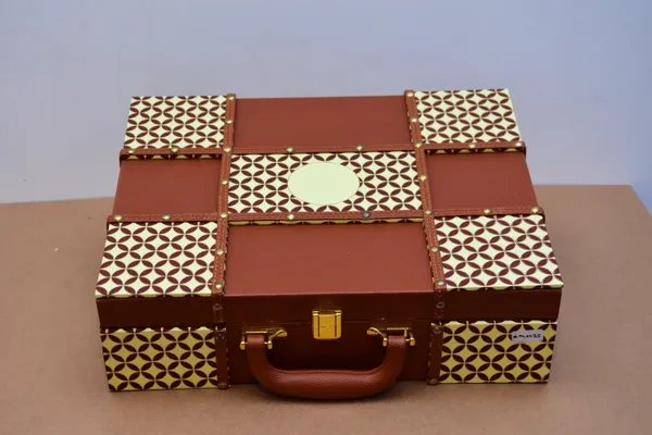 Brown_And_Golden_Handcrafted_Leather_Briefcase_With_Geometric_Pattern_And_Brass_Accents