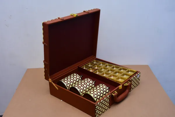 Brown_And_Golden_Handcrafted_Leather_Briefcase_With_Geometric_Pattern_And_Brass_Accents