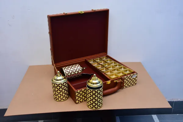 Brown_And_Golden_Handcrafted_Leather_Briefcase_With_Geometric_Pattern_And_Brass_Accents