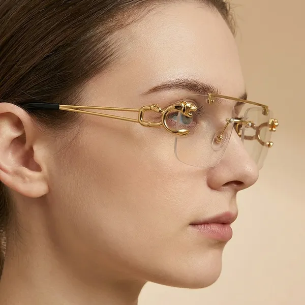 Gold_And_Transparent_Luxury_Rimless_Rectangular_Sunglasses_With_Metal_Frame_And_Clear_Lens
