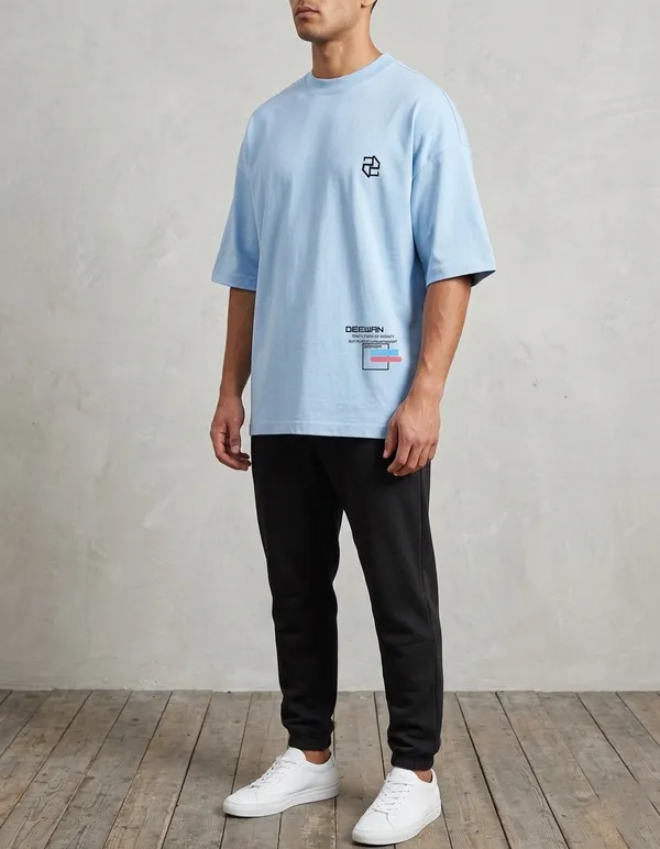 Light_Blue_Graphic_Print_Oversized_T-Shirt_For_Men
