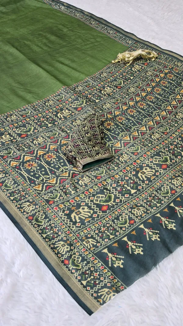 Green_Saree_With_Embroidered_Border_And_Blouse