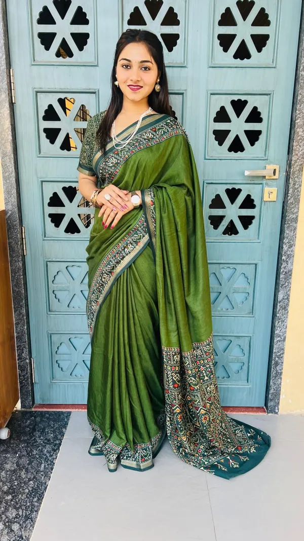 Green_Saree_With_Embroidered_Border_And_Blouse
