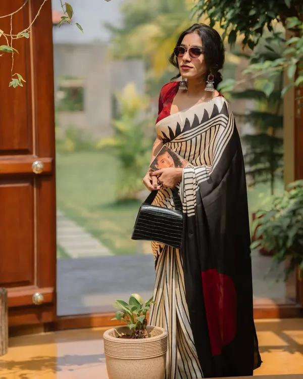 Designer_Black_&_White_Striped_Saree_With_Red_Circle_Motif_And_Red_Floral_Blouse
