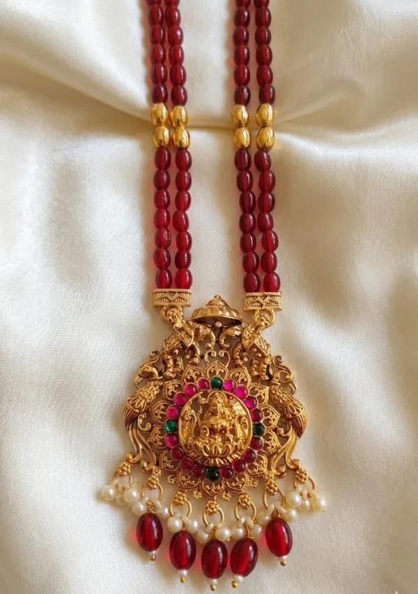 Lakshmi_Devi_Pendant_With_Two_Line_Tumble_Golden_Long_Set_For_Women