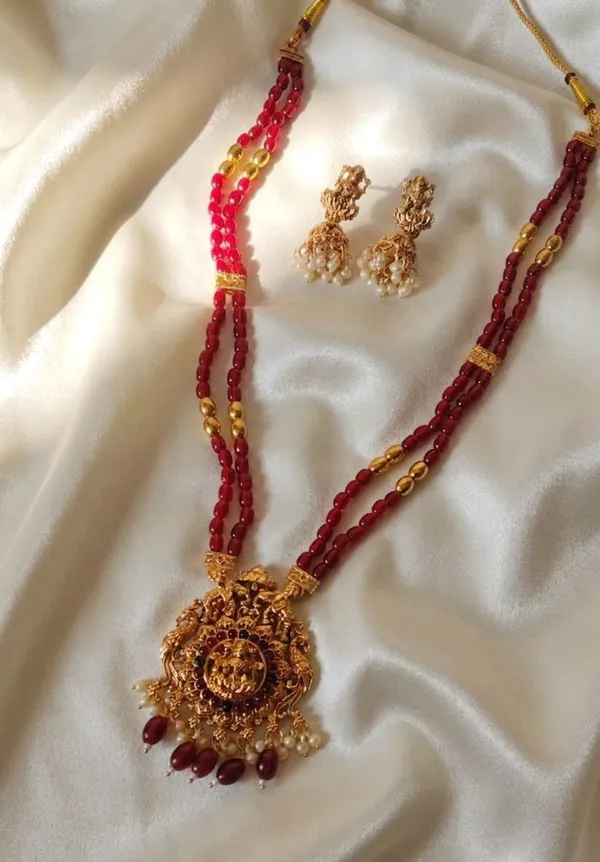 Lakshmi_Devi_Pendant_With_Two_Line_Tumble_Golden_Long_Set_For_Women