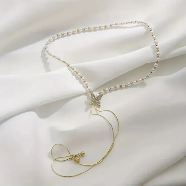 Gold_Pearl_Bow_Drop_Necklace