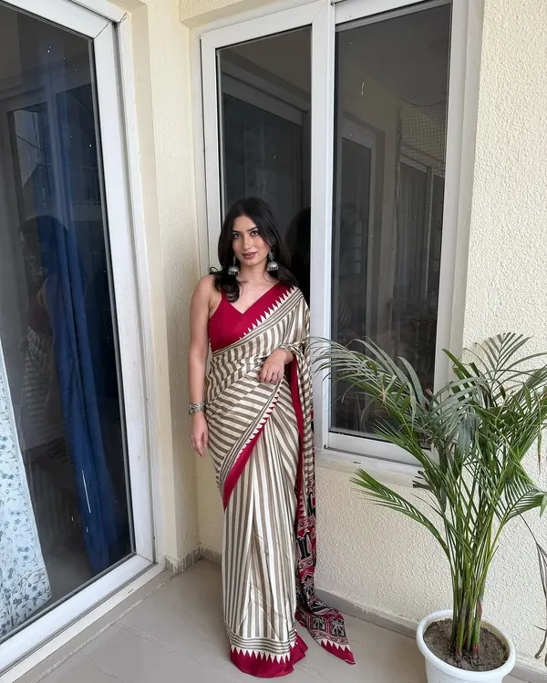 Cream_Striped_Ajrakh_temple_red_pallu_saree