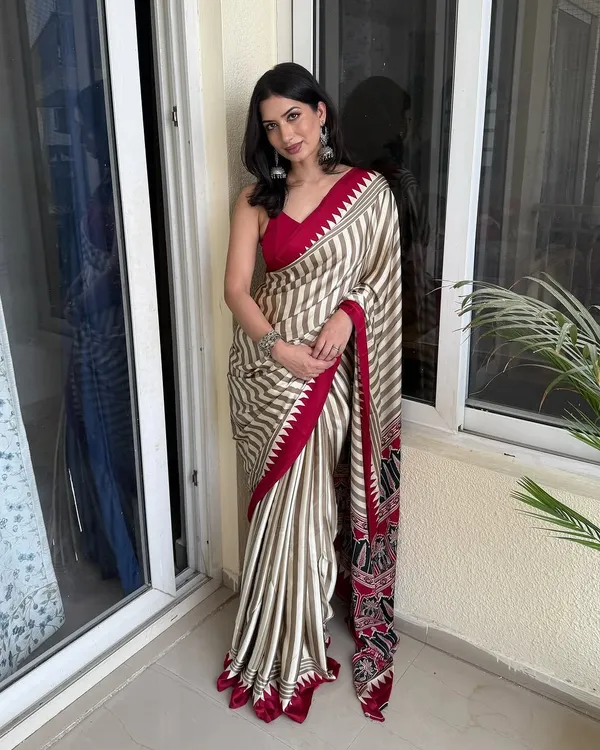Cream_Striped_Ajrakh_temple_red_pallu_saree
