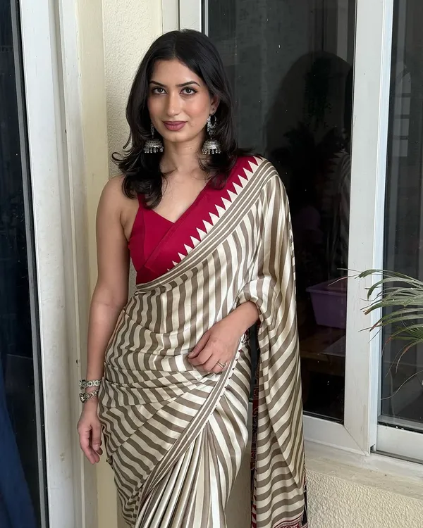 Cream_Striped_Ajrakh_temple_red_pallu_saree