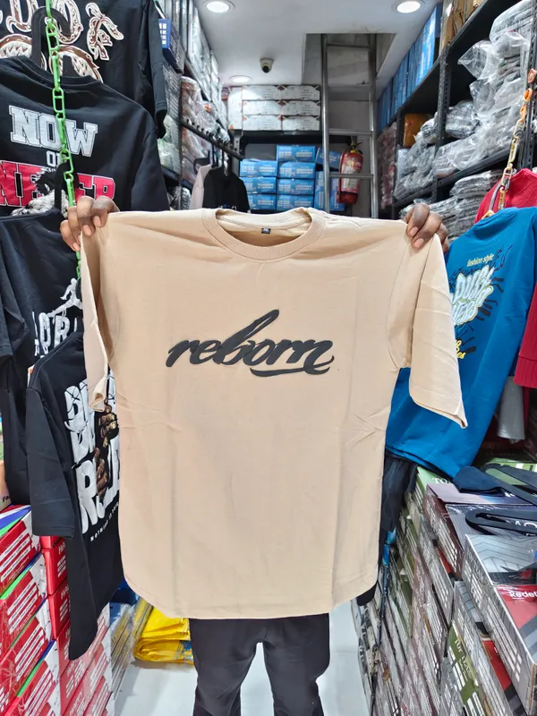 Relax_Printed_Oversized_T-Shirt_With_Eagle_Graphic_-_Beige