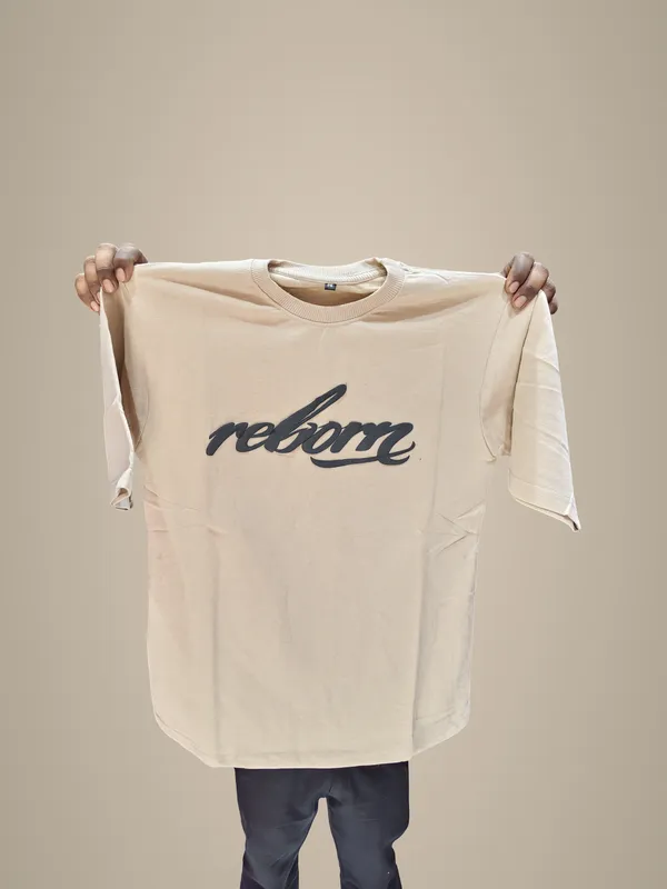 Relax_Printed_Oversized_T-Shirt_With_Eagle_Graphic_-_Beige