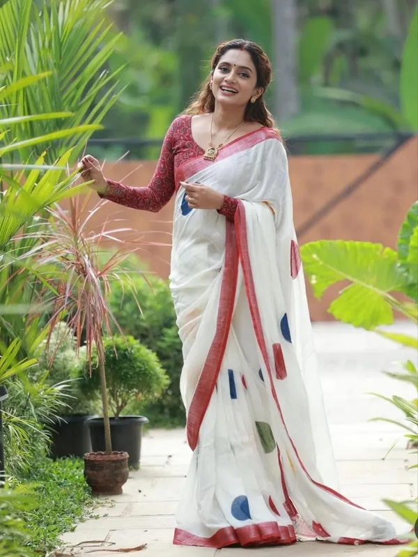 Kaheri_Off-White_Soft_Linen_Saree_with_Contemporary_Geometric_Polka_Prints_&_Red_Border_IPO23