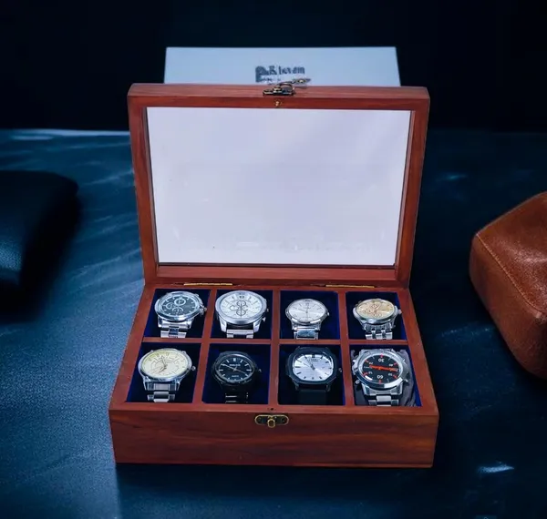 Wooden_Watch_Display_Box_With_Glass_Top_Internal_Reasoning_Protocol_The_Input_Title_Contains_Brand_Artisan_Wood_Crafts_Remove_Marketing_Fluff_Luxury_Remove_Material_Wooden_Keep_Core_To_Product_Product_Type_Watch_Display_Box_Keep_Core_Product_Quantity_Size_8_Slots_Remove_Variant_Detail_Feature_With_Glass_Top_Keep_Distinguishing_Feature_Color_Dark_Brown_Remove_Core_Product_Wooden_Watch_Display_Box_With_Glass_Top