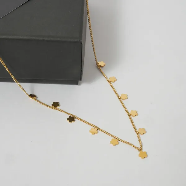 Elegant_Gold-Toned_Floral_Charm_Layered_Necklace