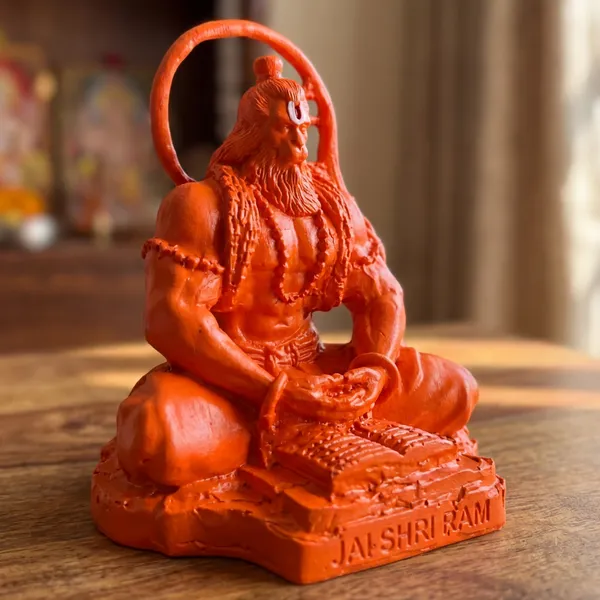 Orange_Hanuman_Ji_Murti_With_Ramayan_Book_Seated_Bajrangbali_Idol_For_Home_Mandir_Pooja_Room_Car_Dashboard_Religious_Resin_Showpiece_For_Spiritual_Decor