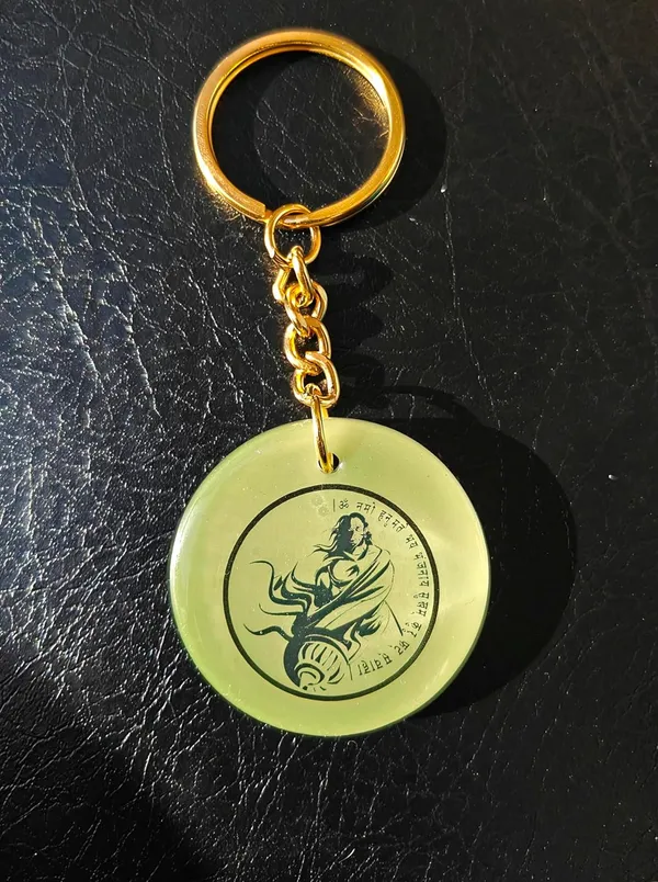 Green_Resin_Keychain_With_Spiritual_Design