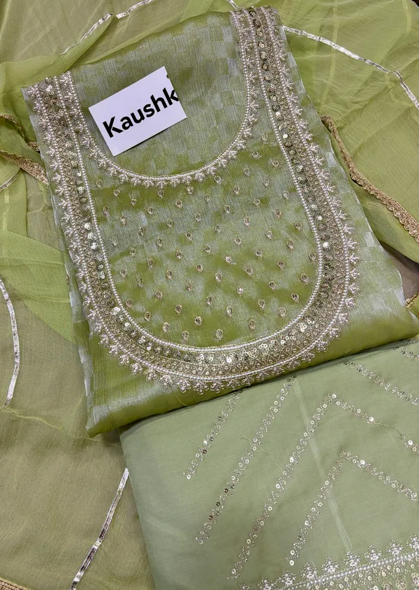 Green_Cotton_Unstiched_Suit_Set_For_Women