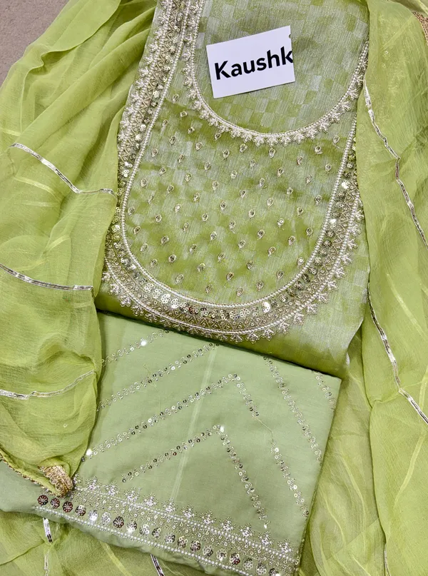 Green_Cotton_Unstiched_Suit_Set_For_Women