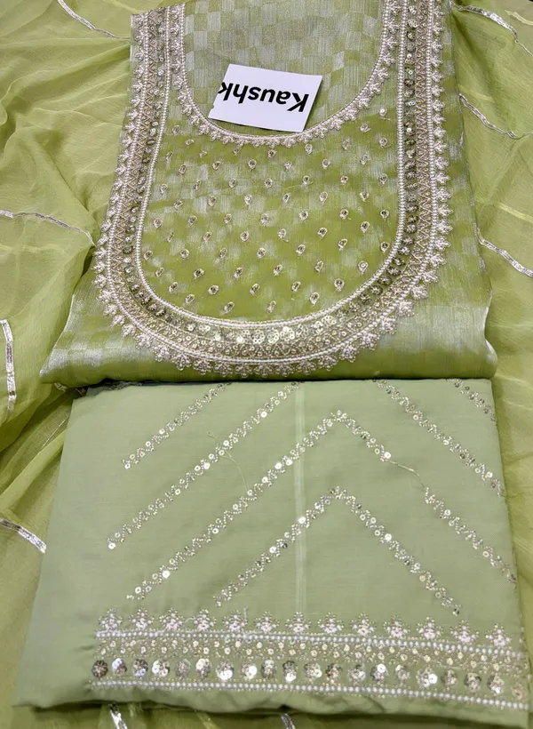Green_Cotton_Unstiched_Suit_Set_For_Women