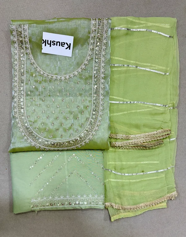 Green_Cotton_Unstiched_Suit_Set_For_Women