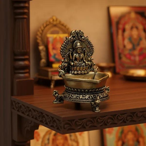 Brass_Goddess_Lakshmi_Diya_-_Decorative_Oil_Lamp_With_Ornate_Prabhavali