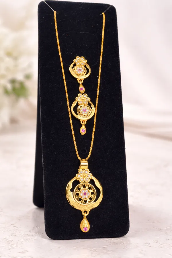 Traditional_Gold_Plated_Floral_Pendant_Necklace_Set_With_Pink_Stone_Accents